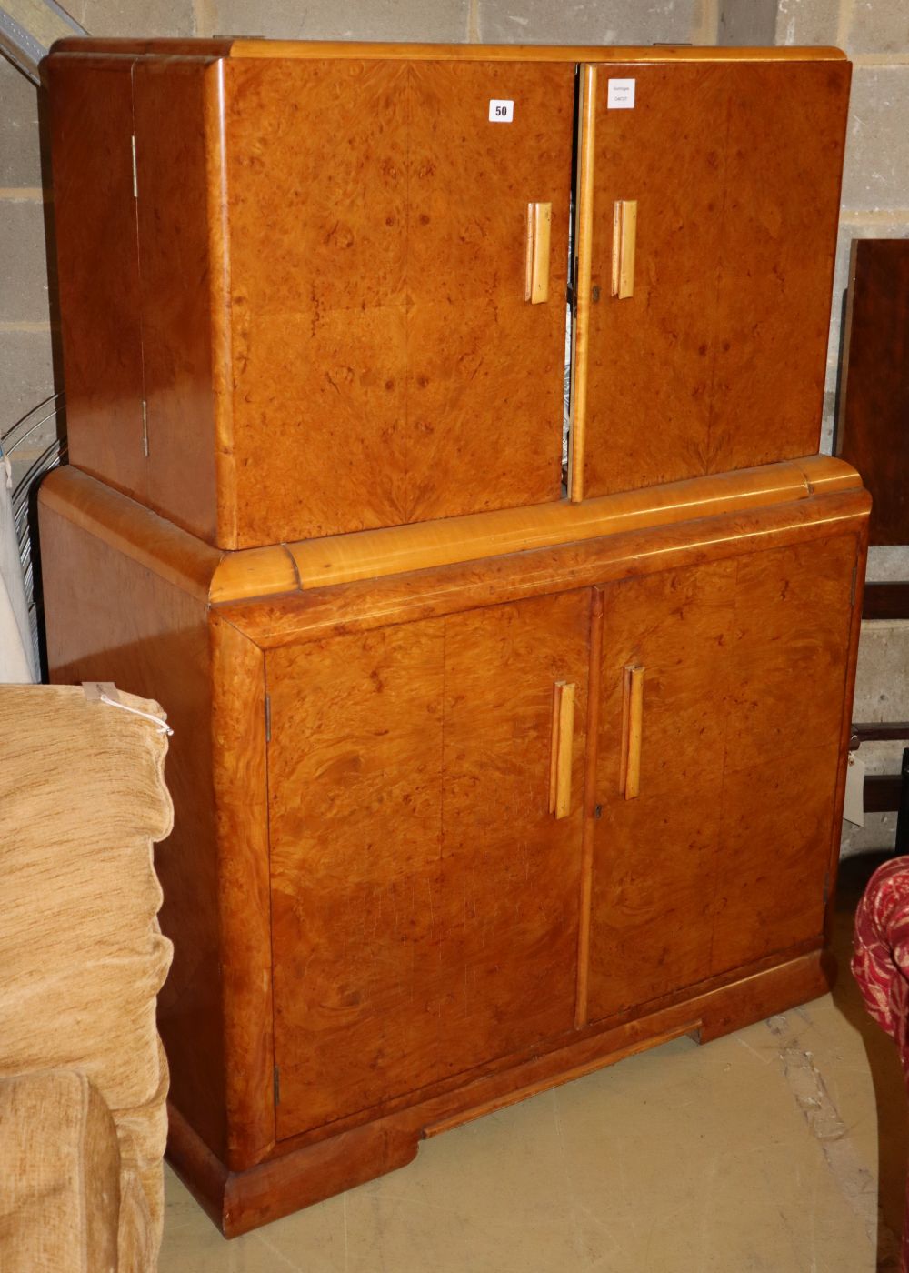 An Art Deco style birds eye maple cocktail cabinet, W.100cm, D.54cm, H.138cm